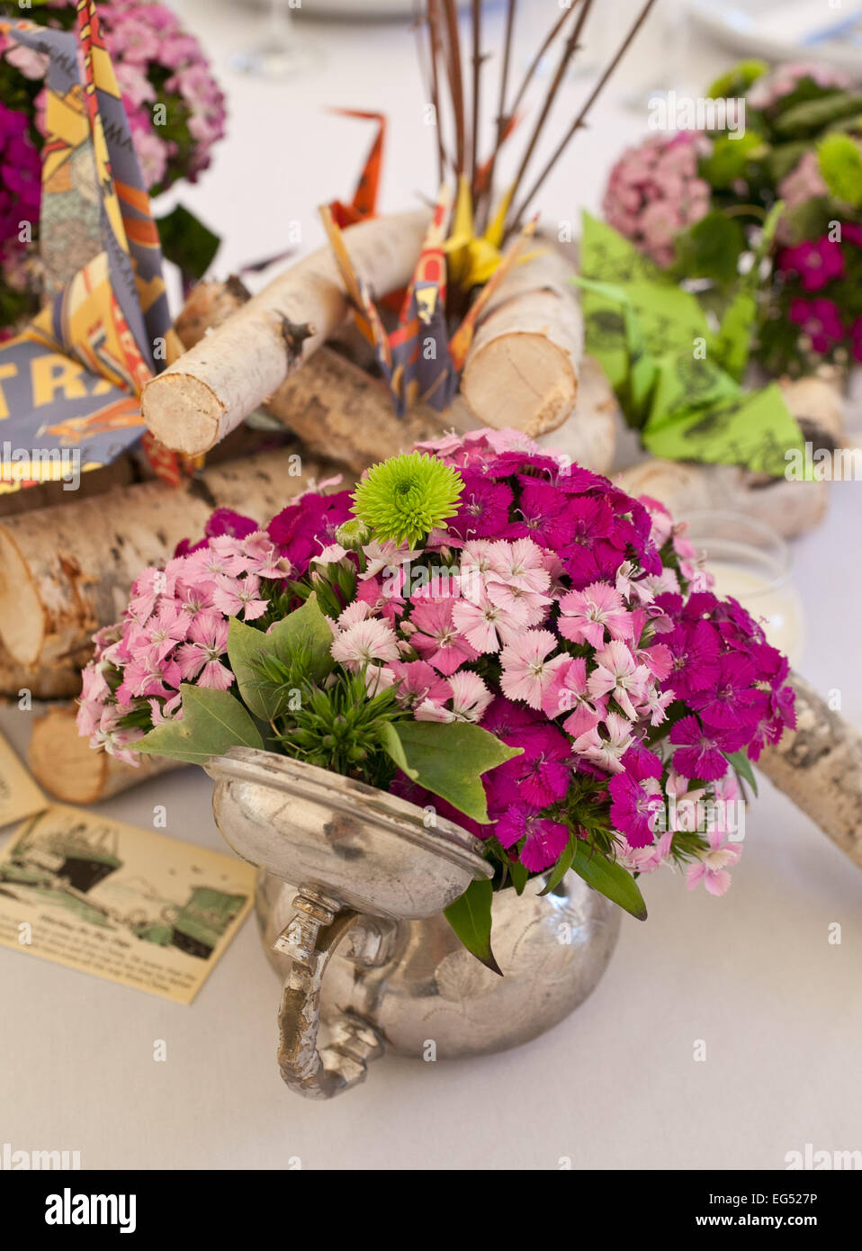 Flowers In A Teapot At A Country Wedding Reception Stock Photo