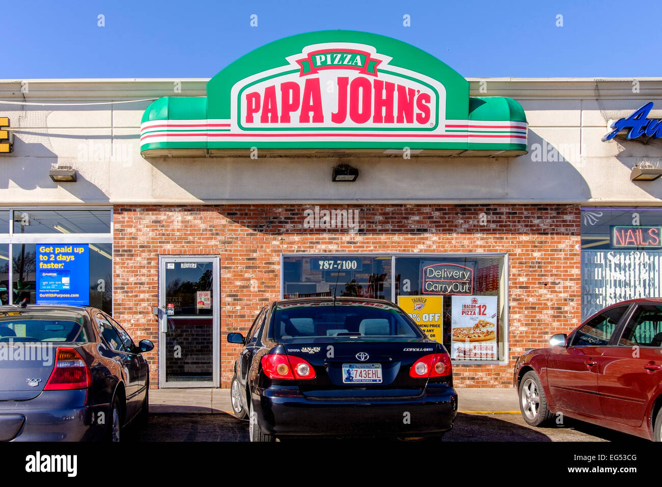 Papa John's Pizza in Oklahoma City, Oklahoma, USA. a take and bake at home pizzaria with fresh ingredients. Stock Photo