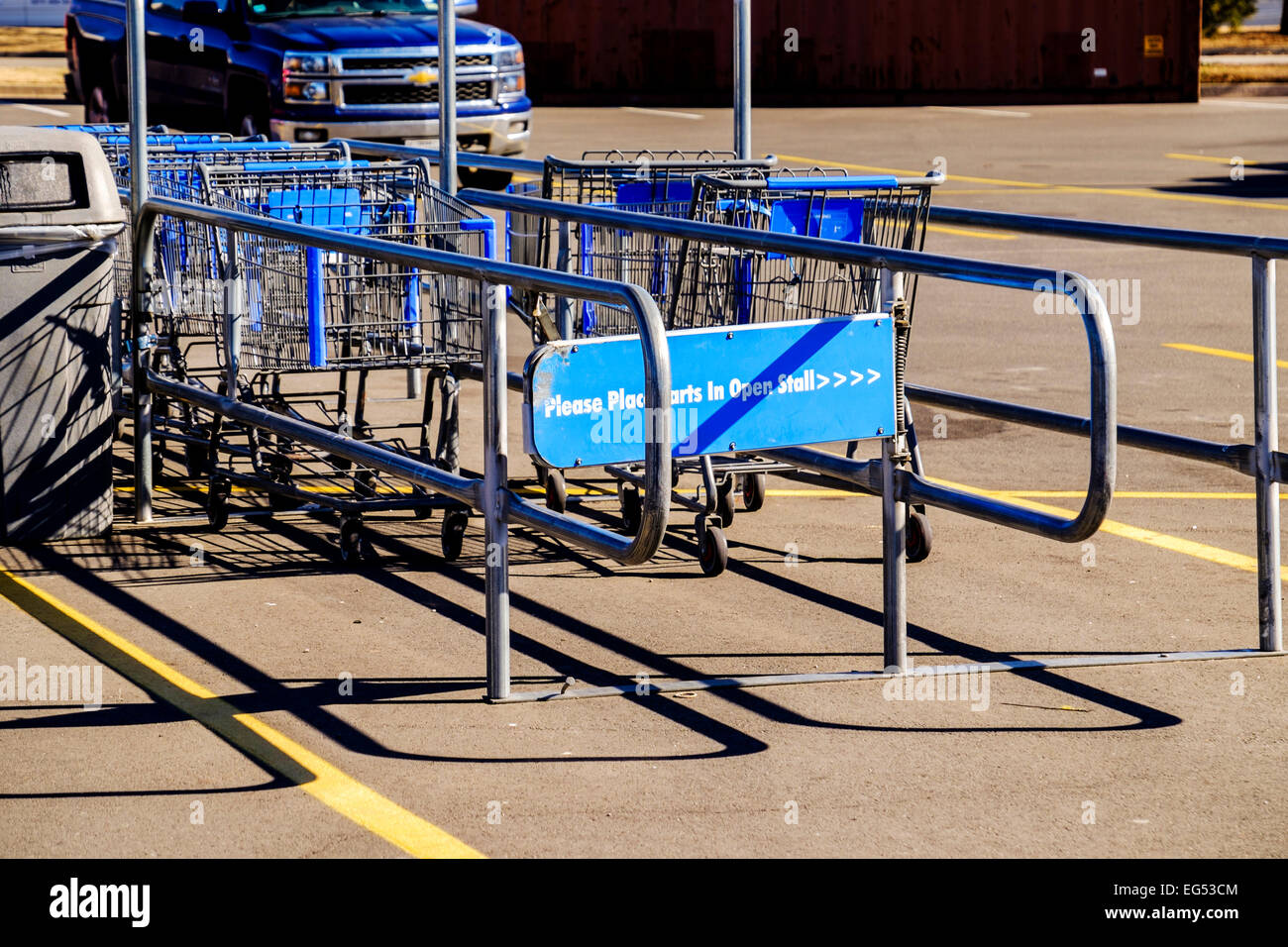 Shopping carts inside a corral in a WalMart parking lot in Oklahoma City, Oklahoma. USA. Stock Photo