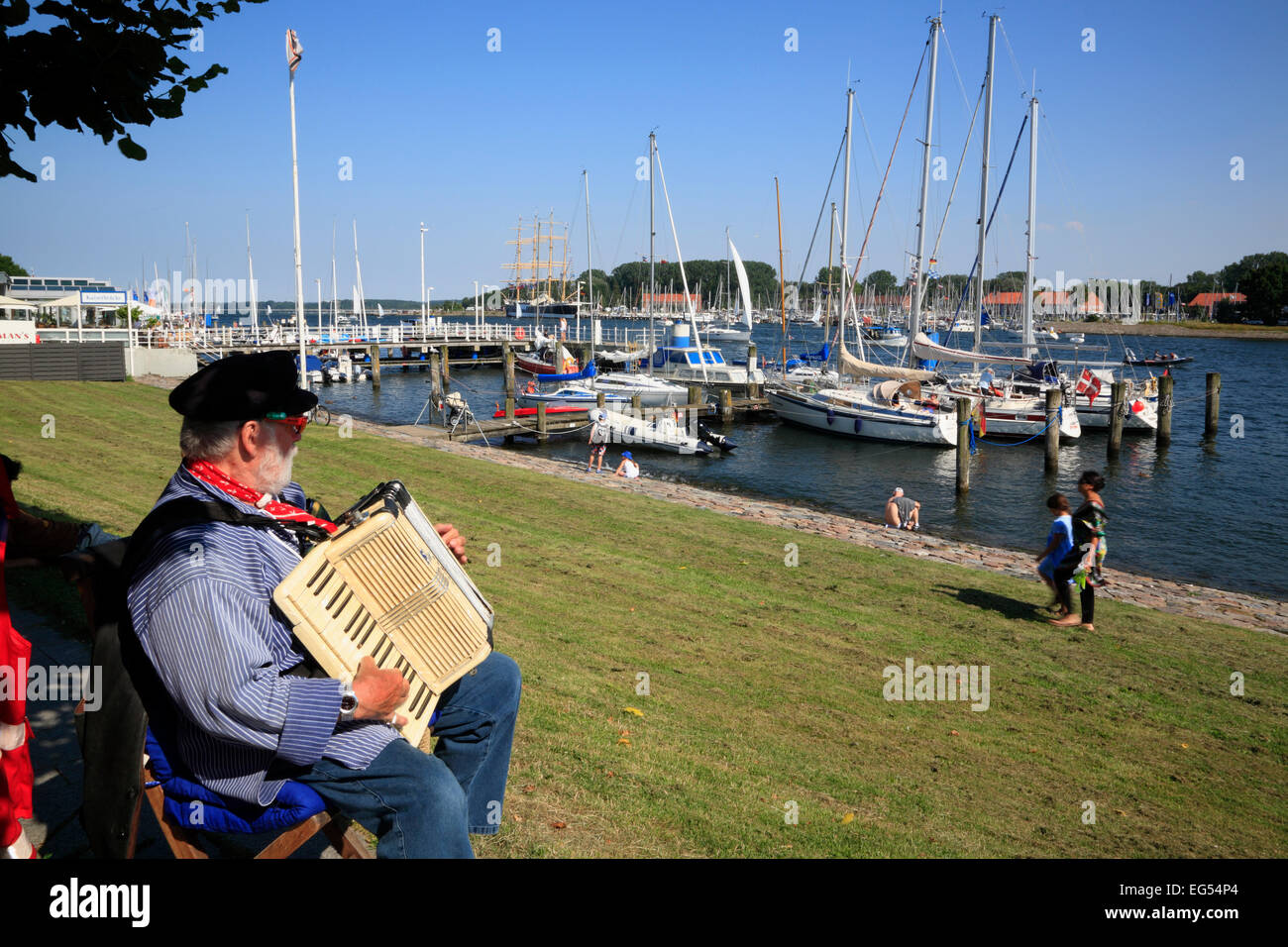 Traditional musician at river Trave, Travemuende, Baltic Sea coast, Germany, Europe Stock Photo