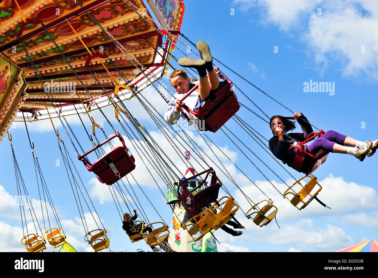 Fair fairground ride swing hires stock photography and images Alamy