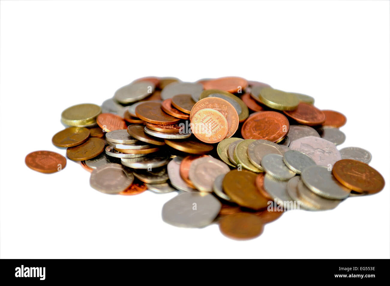 pile of copper and silver uk British coins on a white background Stock