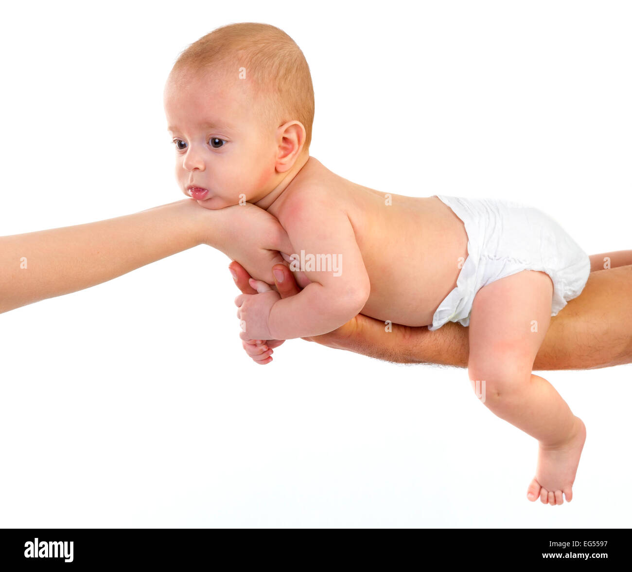 baby newborn on parents hands. new born kid and family concept. Stock Photo