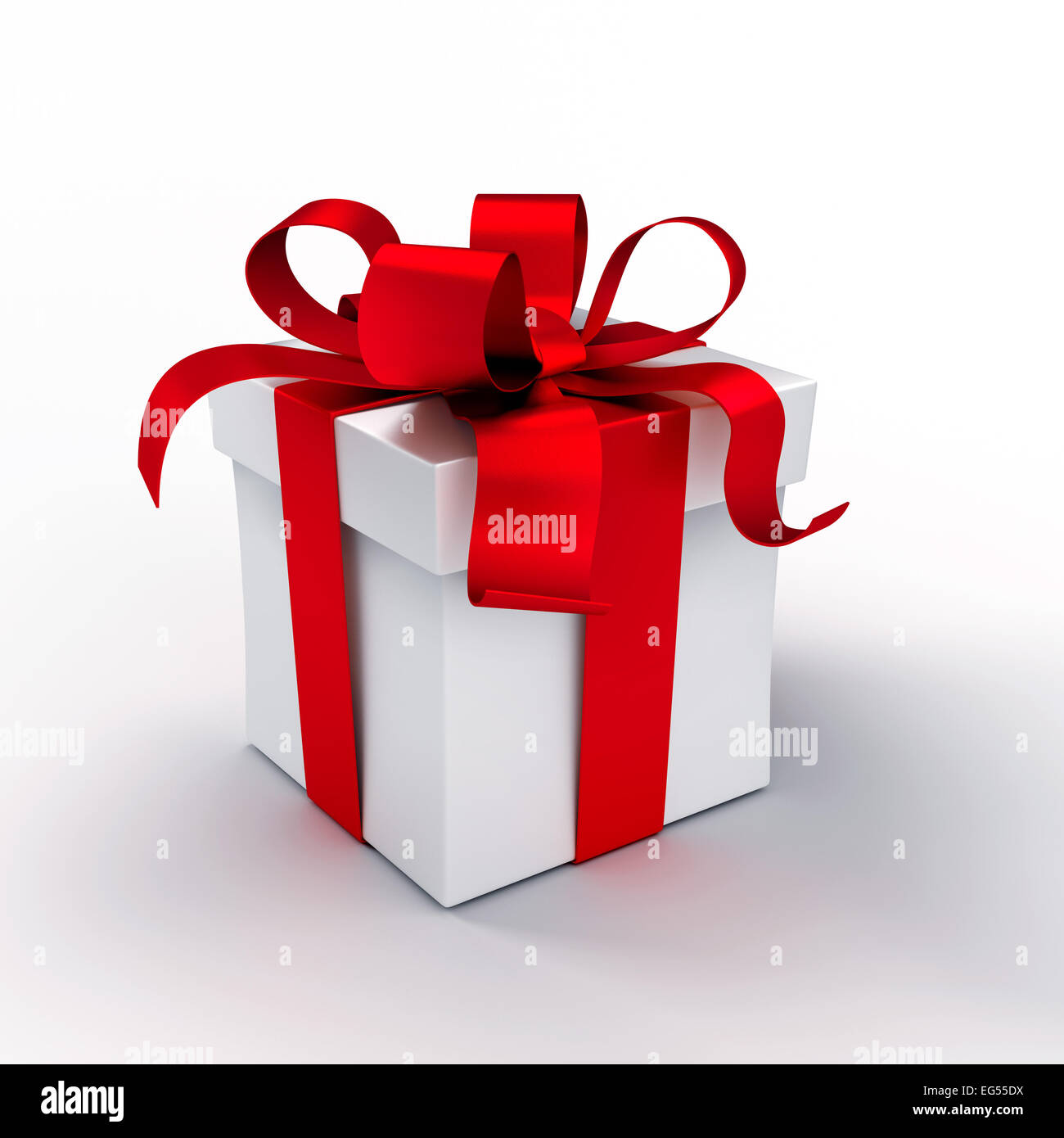 White gift box tied up with red ribbons, isolated on white Stock Photo