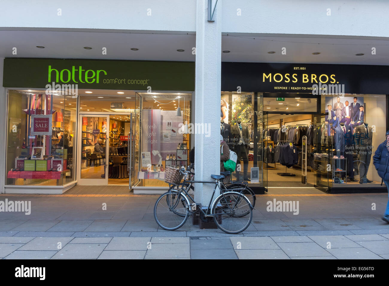 Hotter and Moss Bros shop fronts in Petty Cury Cambridge City Cambridgeshire England Stock Photo