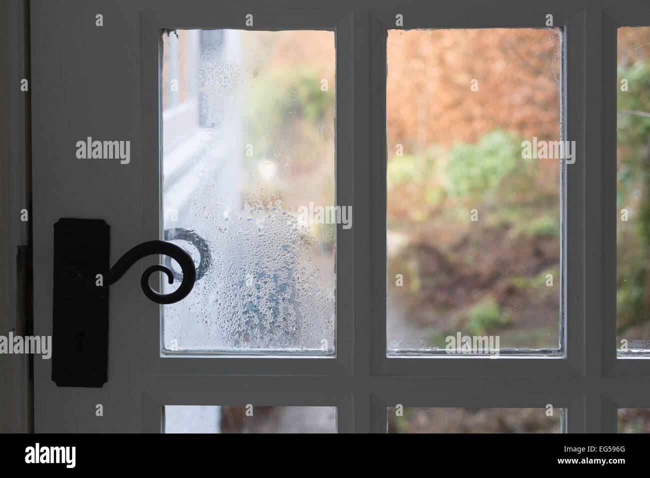Blown sealed double glazing unit condensation and cloudiness Stock Photo