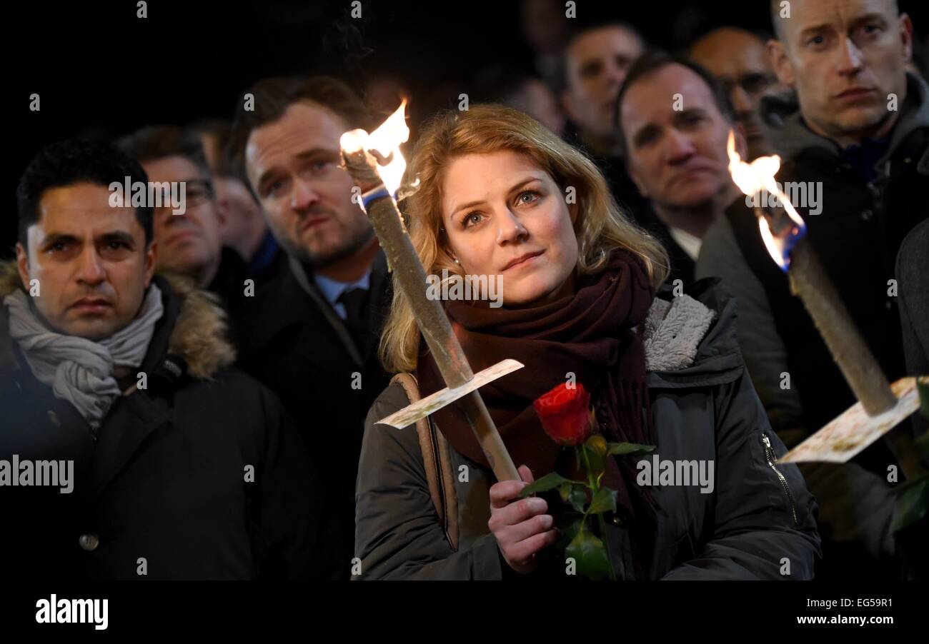 Copenhagen, Denmark. 16th Feb, 2015. Johanne Schmidt-Nielsen, Member of the Danish Parliament for Red-Green Alliance attends a memorial service held for those killed on 14 February by a 22-year-old gunman, in Copenhagen, Denmark, 16 February 2015. Danish police said they had charged two people with aiding the man suspected of shooting dead two people in attacks on a synagogue and an event promoting free speech in Copenhagen at the weekend. Photo: Britta Pedersen/dpa/Alamy Live News Stock Photo
