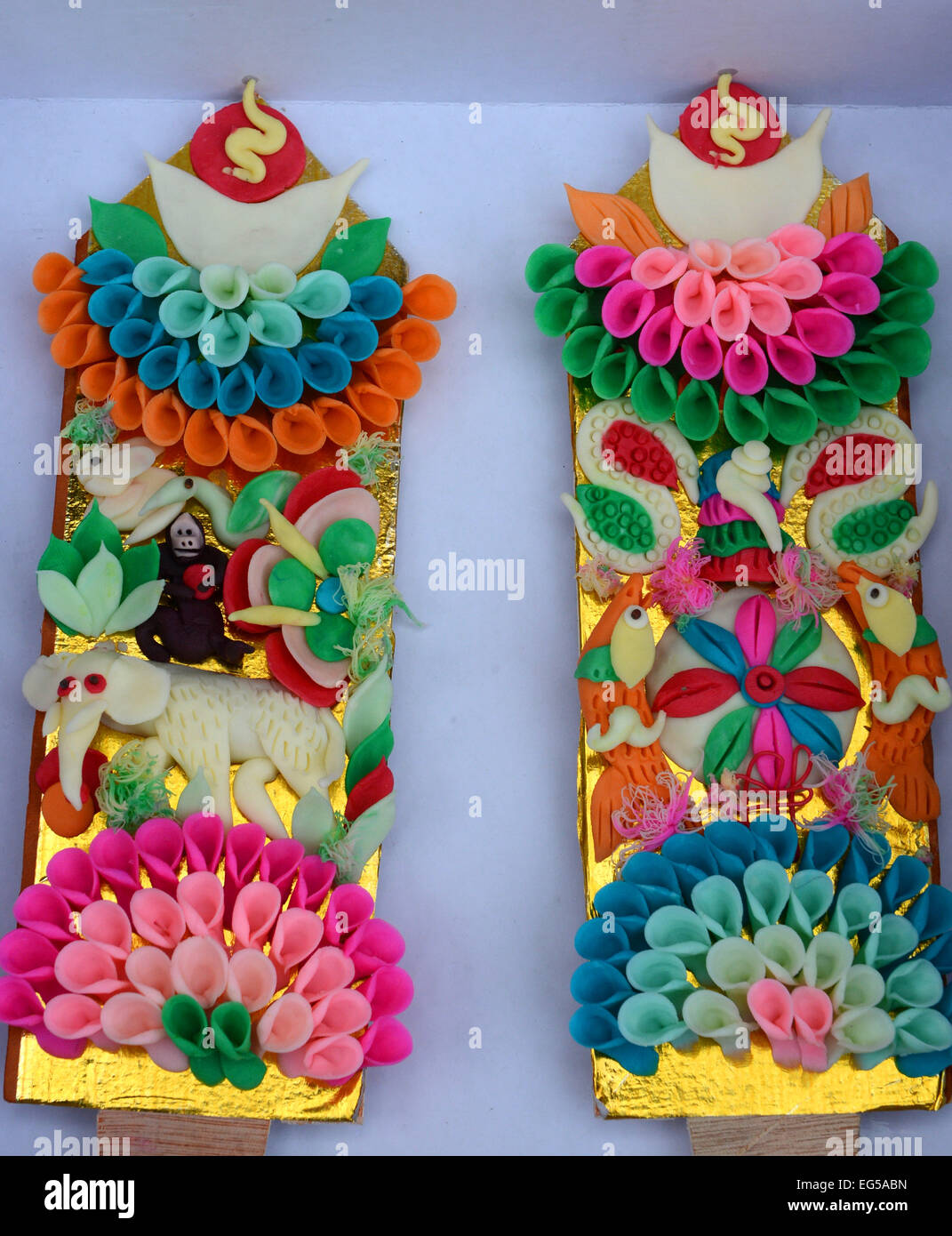 Lhasa. 17th Feb, 2015. Photo taken on Feb. 17, 2015 shows butter sculptures for sale in Lhasa, capital of southwest China's Tibet Autonomous Region. Tibetan people were busy with purchasing goods for the coming Tibetan New Year or Losar, which happens to fall on Feb. 19, the same day with Chinese Lunar New Year. © Chogo/Xinhua/Alamy Live News Stock Photo