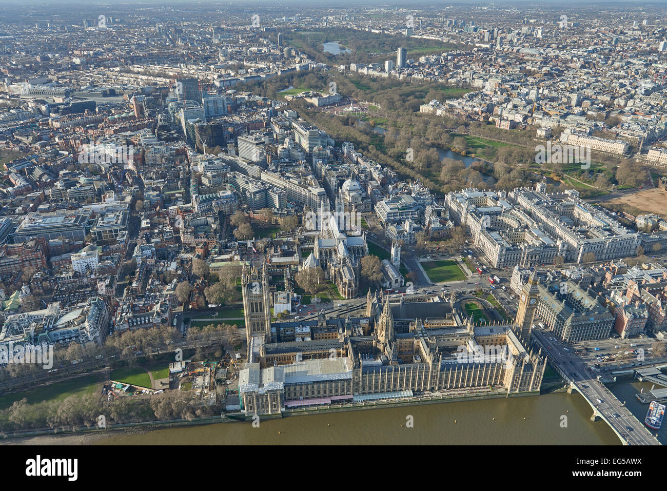An aerial view of the Houses of Parliament with Westminster Abbey, Green Park and Hyde Park visible in the background Stock Photo