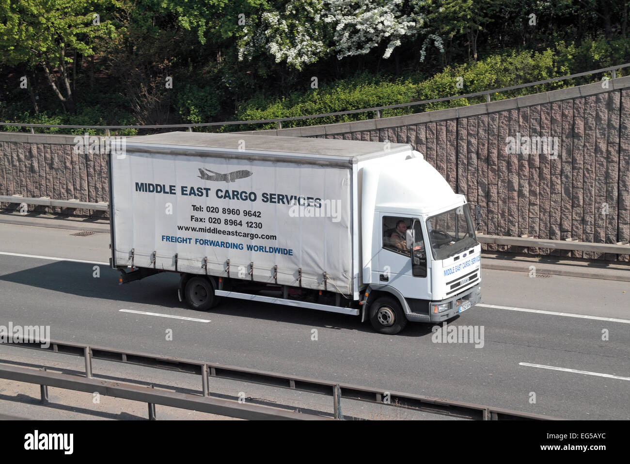 A Middle East Cargo Services freight lorry on the A40 in West London, UK  Stock Photo - Alamy
