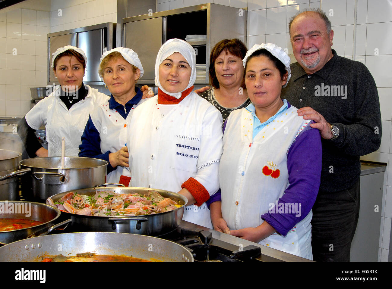 Marche , Ascoli Piceno , San Benedetto del Tronto , Fish Soup Sanbenedettese , the staff of the cooks of the restaurant 'Molo Sud' of St. Benedetto del Tronto. Stock Photo