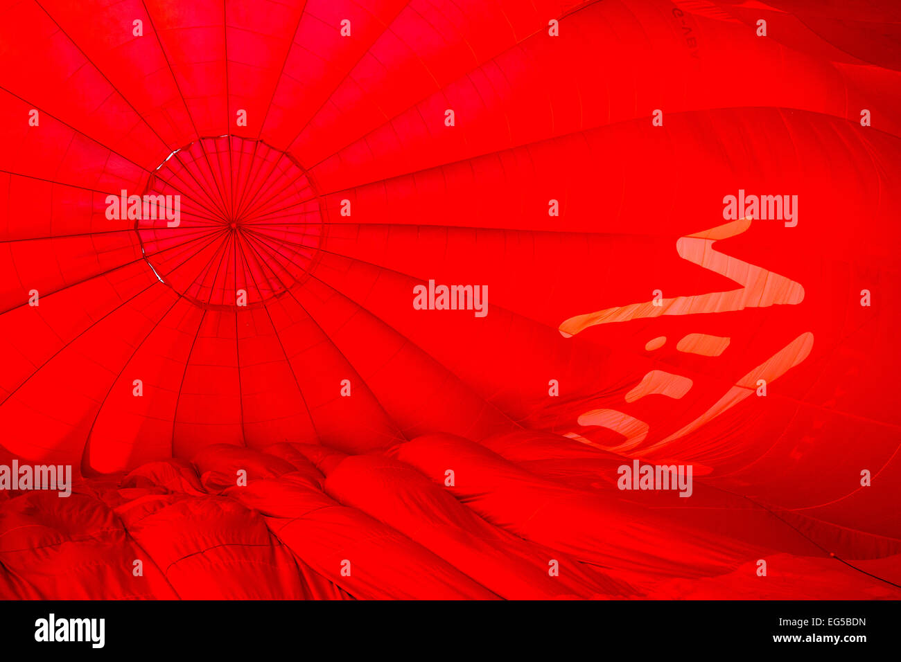Detail of the inside floating red hot air balloon Stock Photo