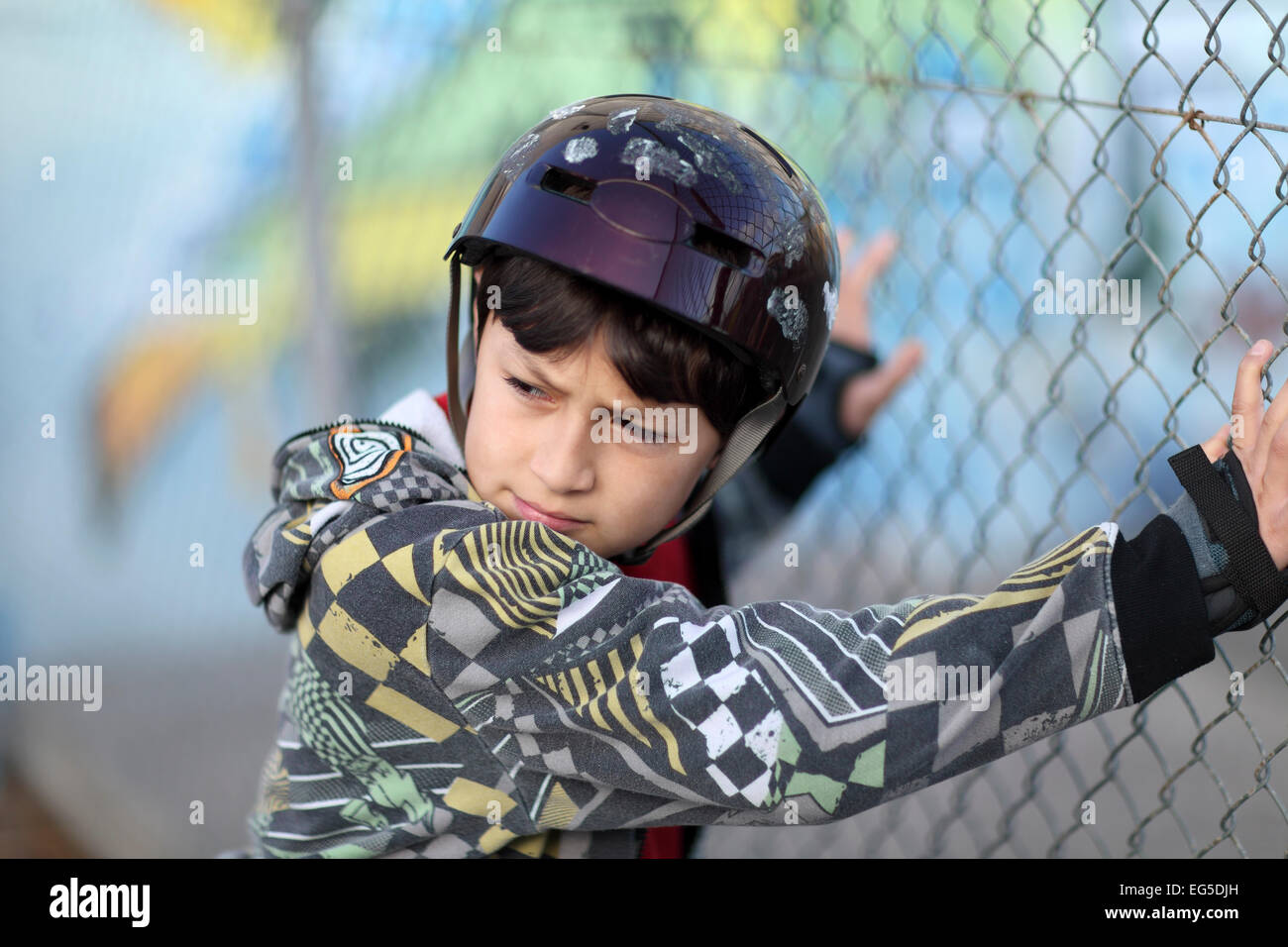Young boy in skateboard helmet Stock Photo