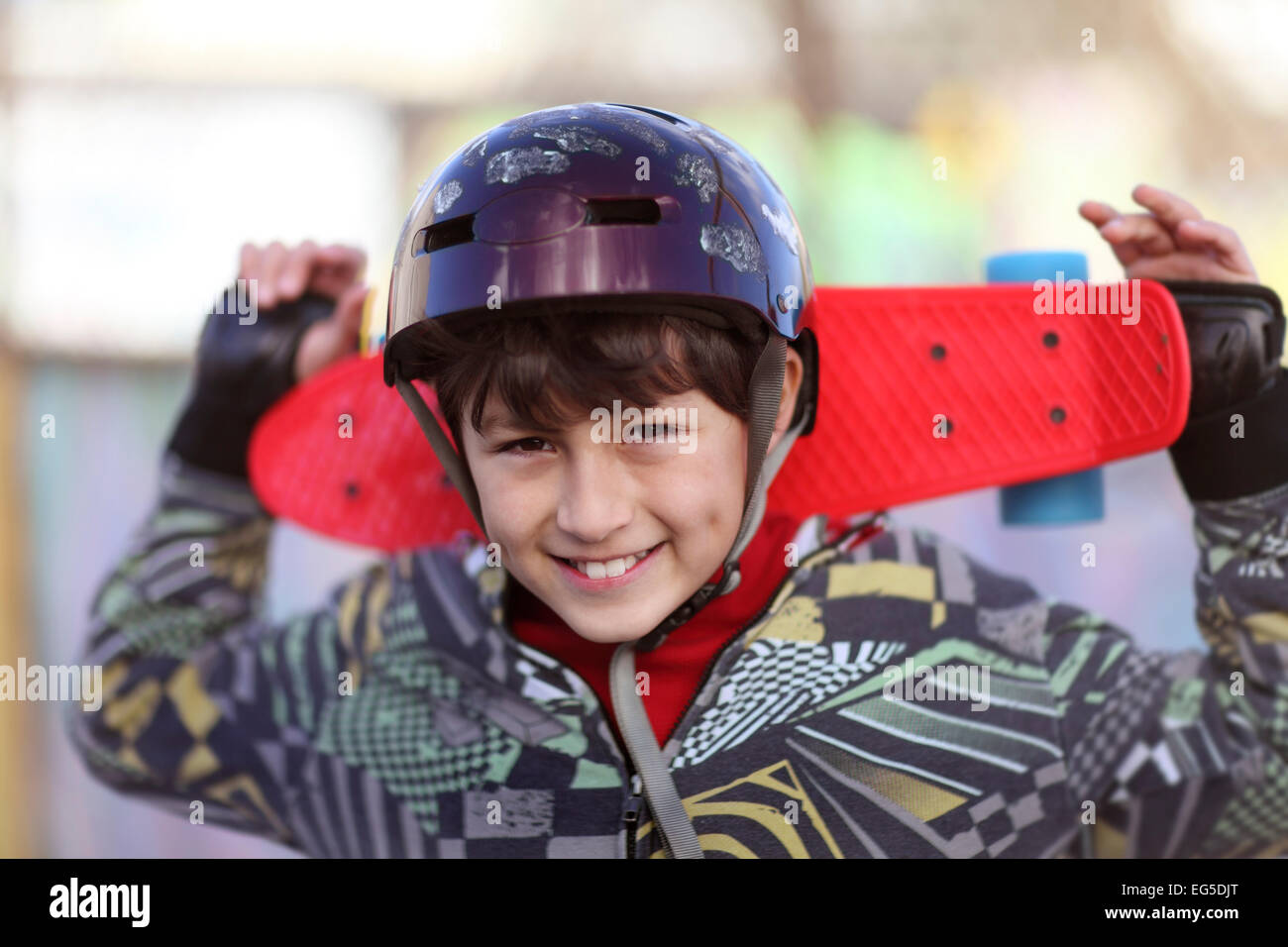 Young boy in skateboard helmet Stock Photo