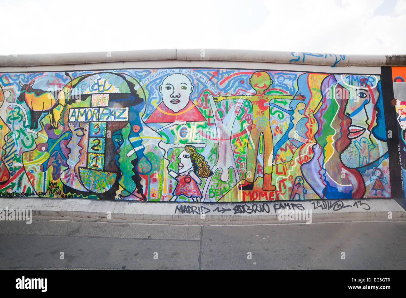 BERLIN, July 26: Graffiti at the East Side Gallery on July 26, 2013 in Berlin,Germany. It documents a time of change and hopes. Stock Photo