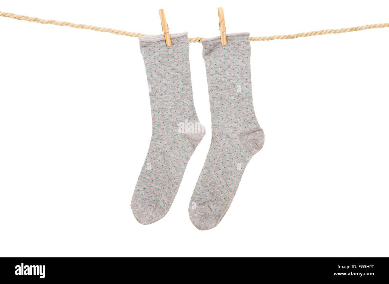 socks hanging on a rope clothesline Stock Photo - Alamy