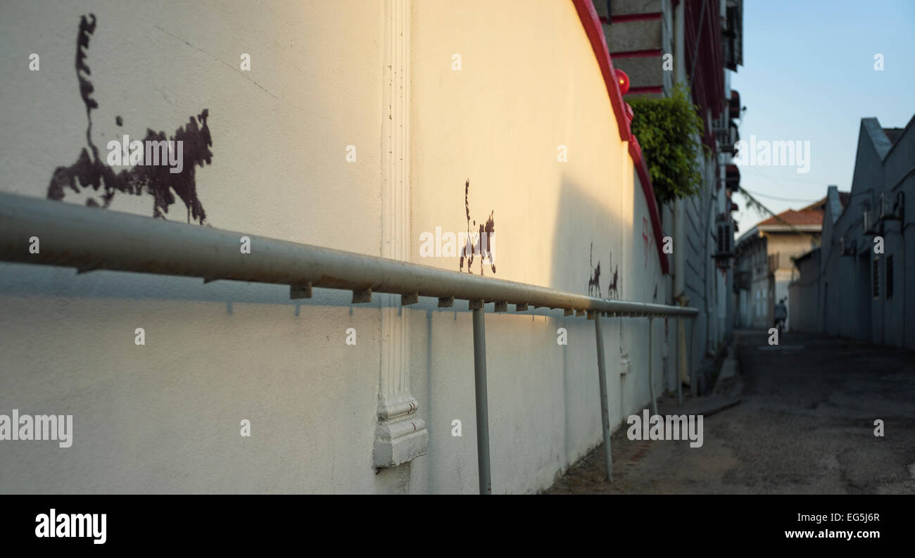 Creative cat murals walking on handrail Stock Photo