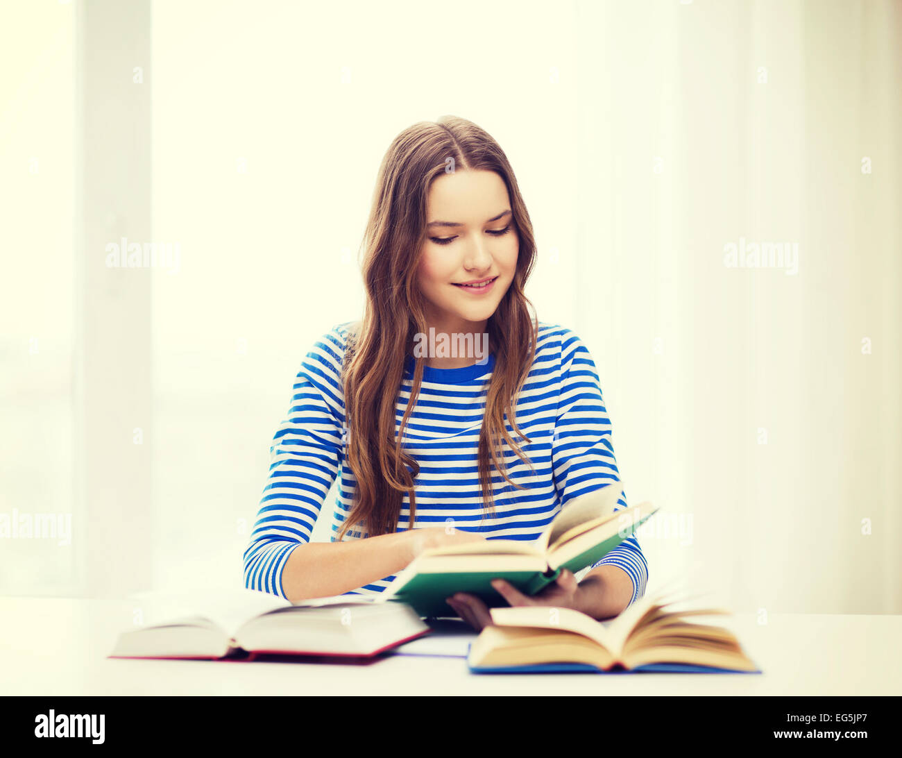 happy smiling student girl with books Stock Photo - Alamy