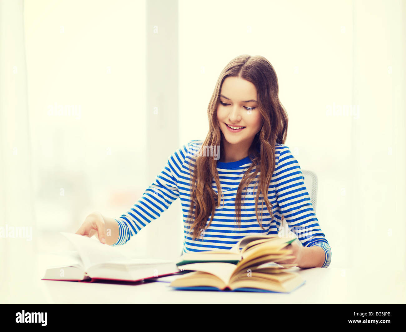 happy smiling student girl with books Stock Photo - Alamy