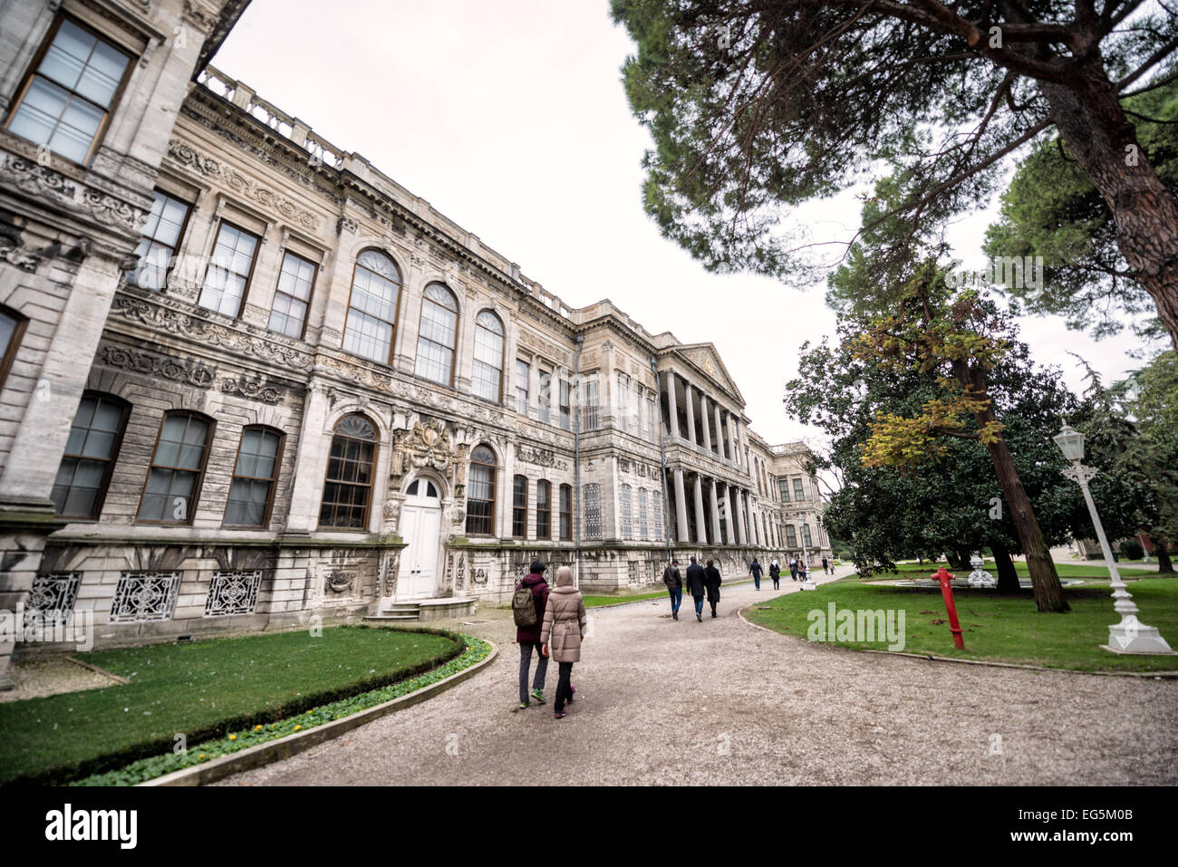 ISTANBUL, Turkey (Turkiye) — Dolmabahçe Palace, on the banks of the Bosphorus Strait, was the administrative center of the Ottoman Empire from 1856 to 1887 and 1909 to 1922. Built and decorated in the Ottoman Baroque style, it stretches along a section of the European coast of the Bosphorus Strait in central Istanbul. Stock Photo