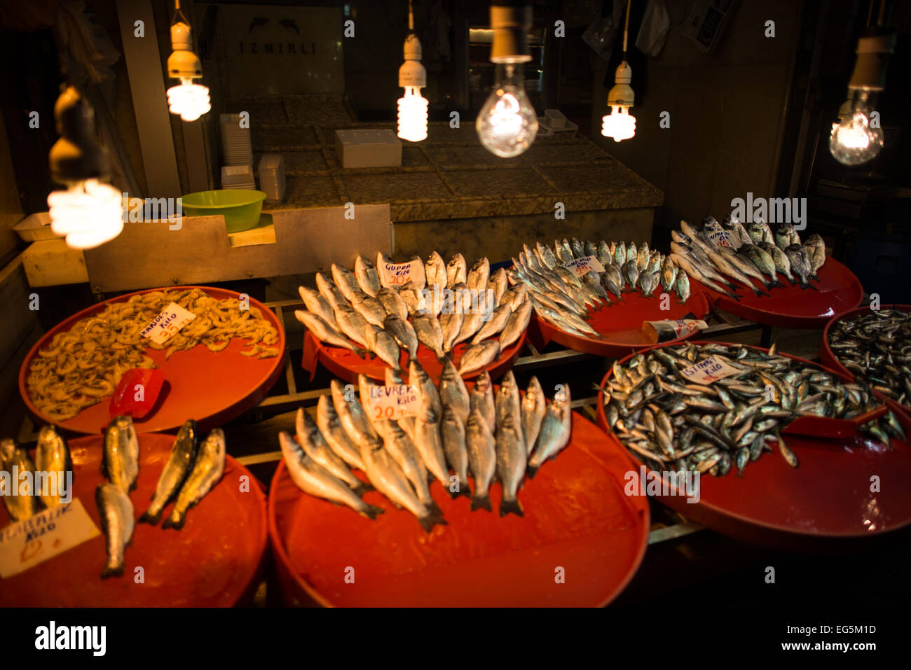 A store selling fish at Istanbul's Spice Bazaar. Located in the Eminonu quarter of Istanbul, next to the Galata Bridge, the Spice Bazaar is one of the city's largest and most famous markets. It is also known as the Egyptian Bazaar. Stock Photo