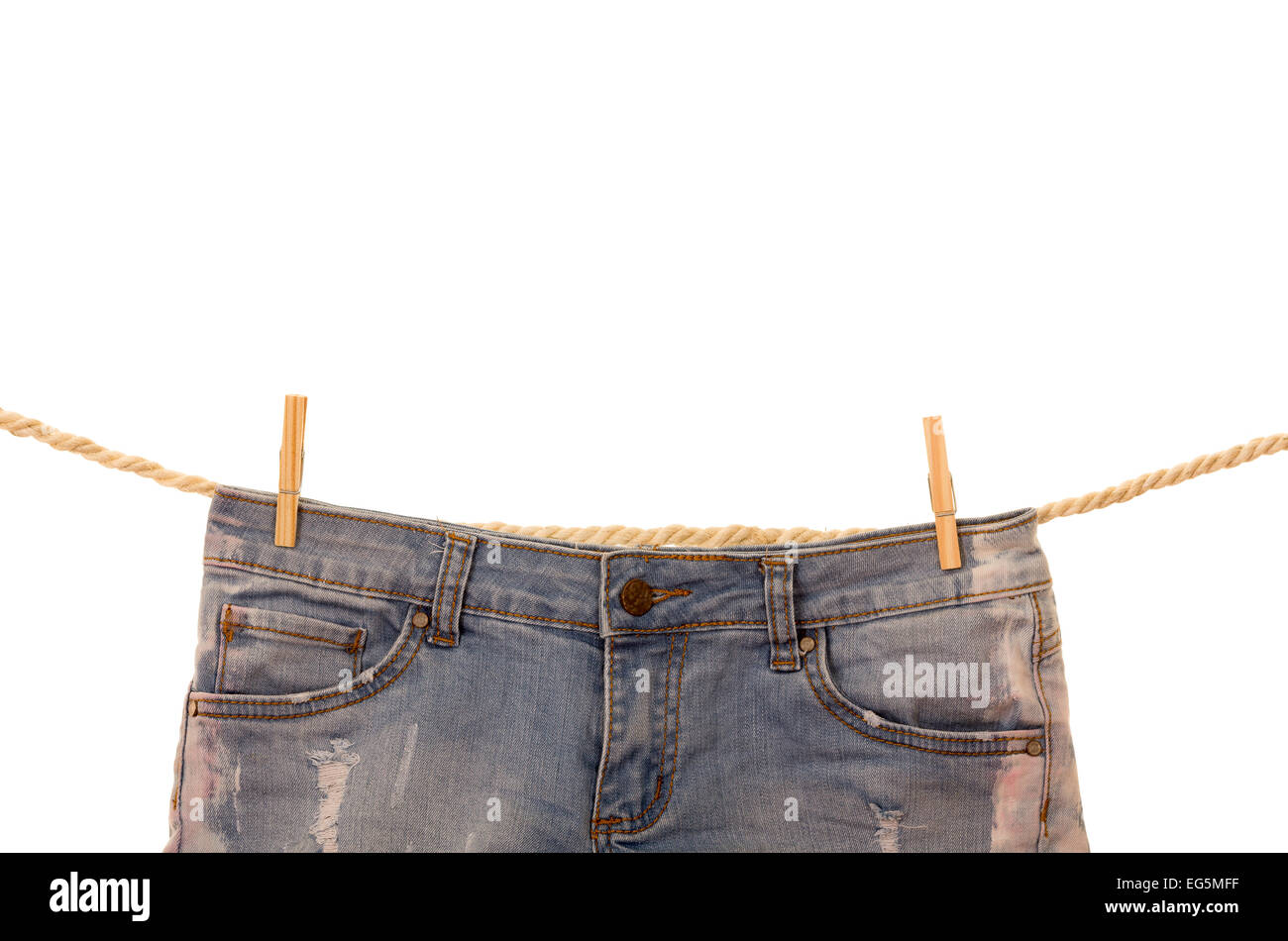 jeans hanging on a rope clothesline Stock Photo Alamy