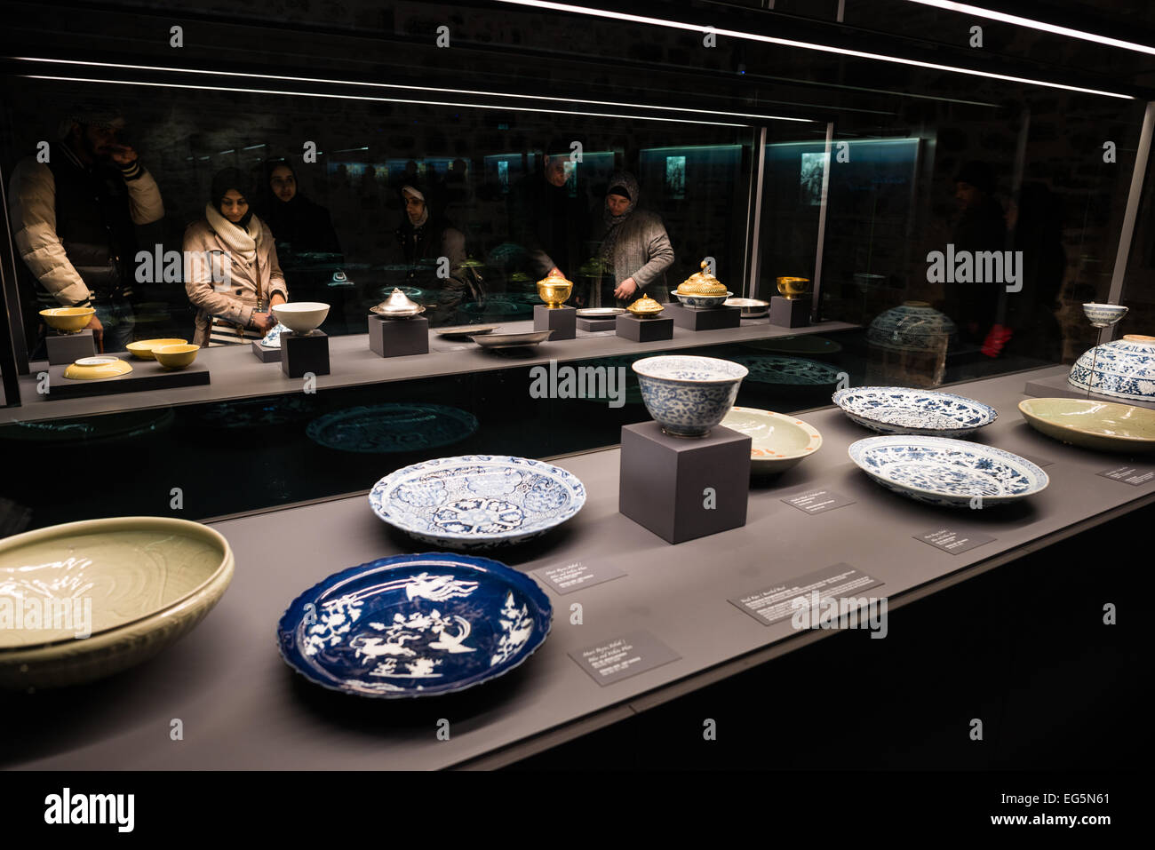 Items on display in exhibits in the former kitchens of Topkapi Palace, Istanbul. The row of massive kitchens that once fed the palace's inahbitants and guests has been converted into museum space displaying some of the tools and utensils used there. On a peninsula overlooking both the Bosphorus Strait and the Golden Horn, Topkapi Palace was the primary residence of the Ottoman sultans for approximately 400 years (1465–1856) of their 624-year reign over Constantinople and the Ottoman Empire. Today it is one of Istanbul's primary tourist attractions. Stock Photo