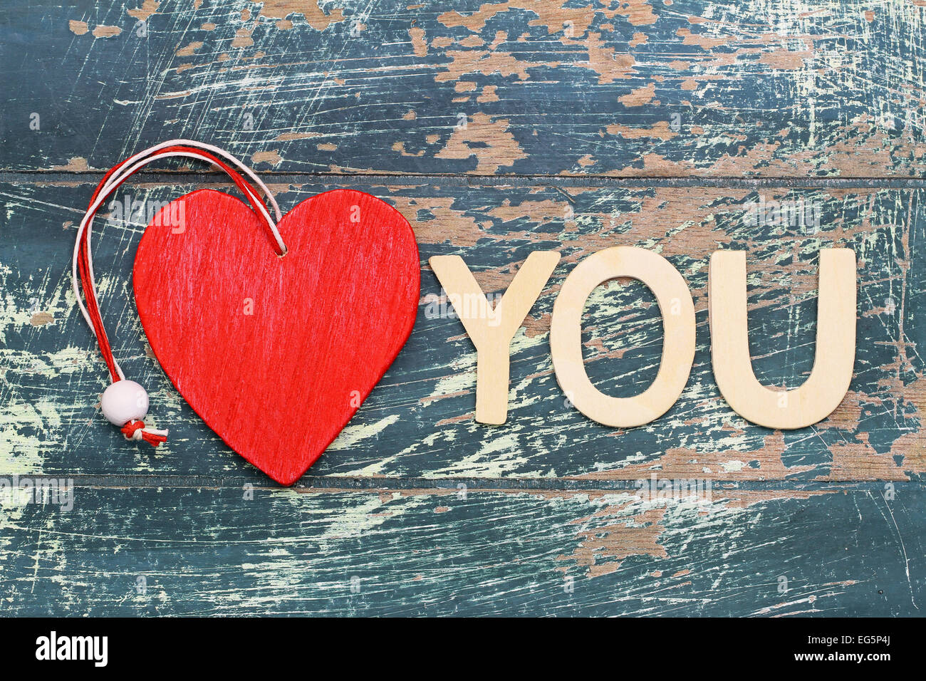 Love you sign on rustic wooden surface Stock Photo