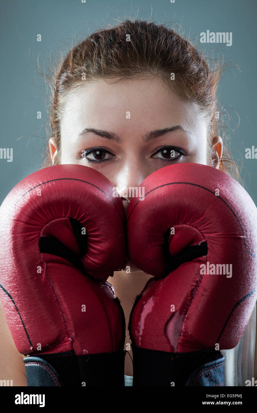 worn out boxing gloves