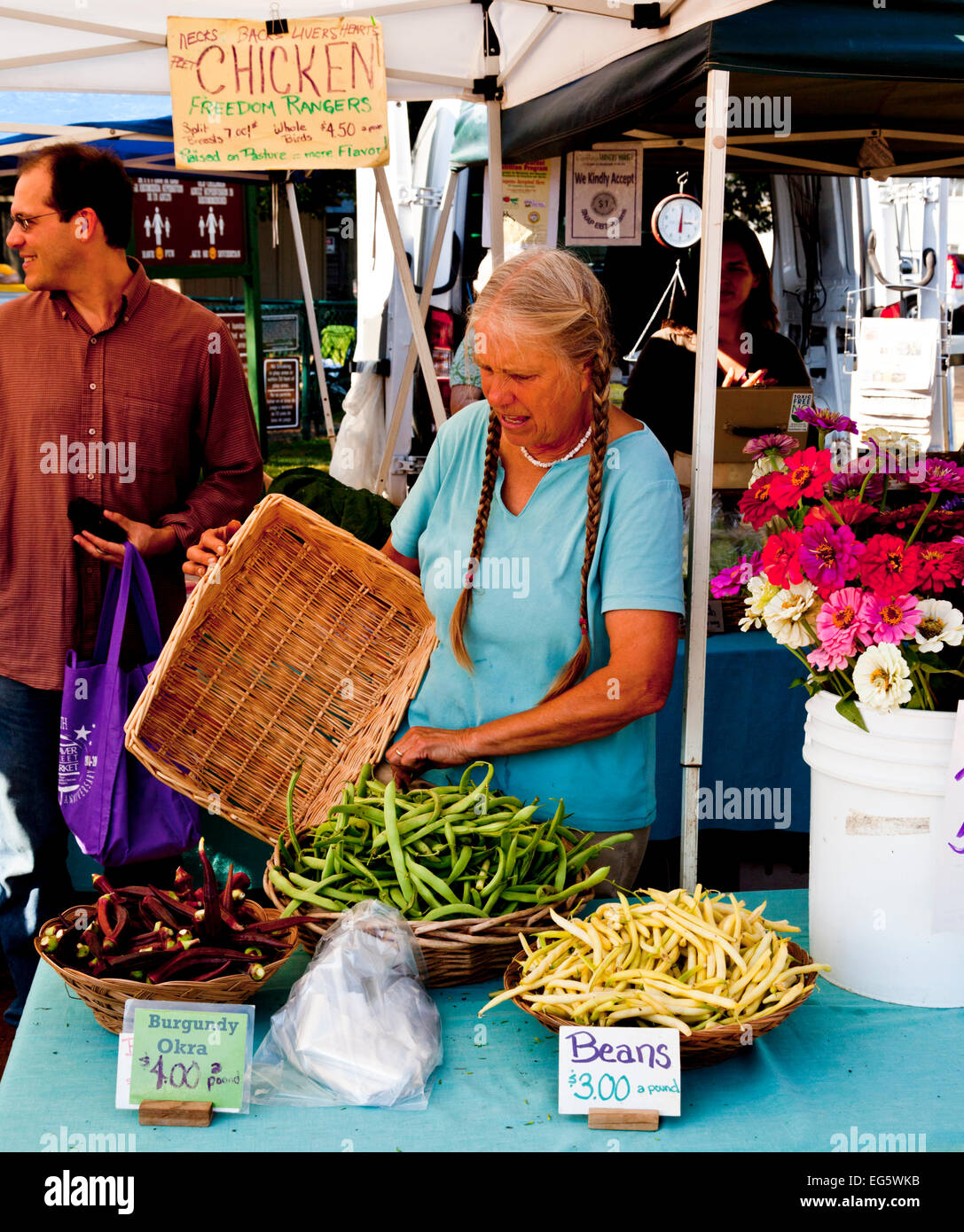 Trader setting up her stall in the Farmers Market, Chapel Hill, North