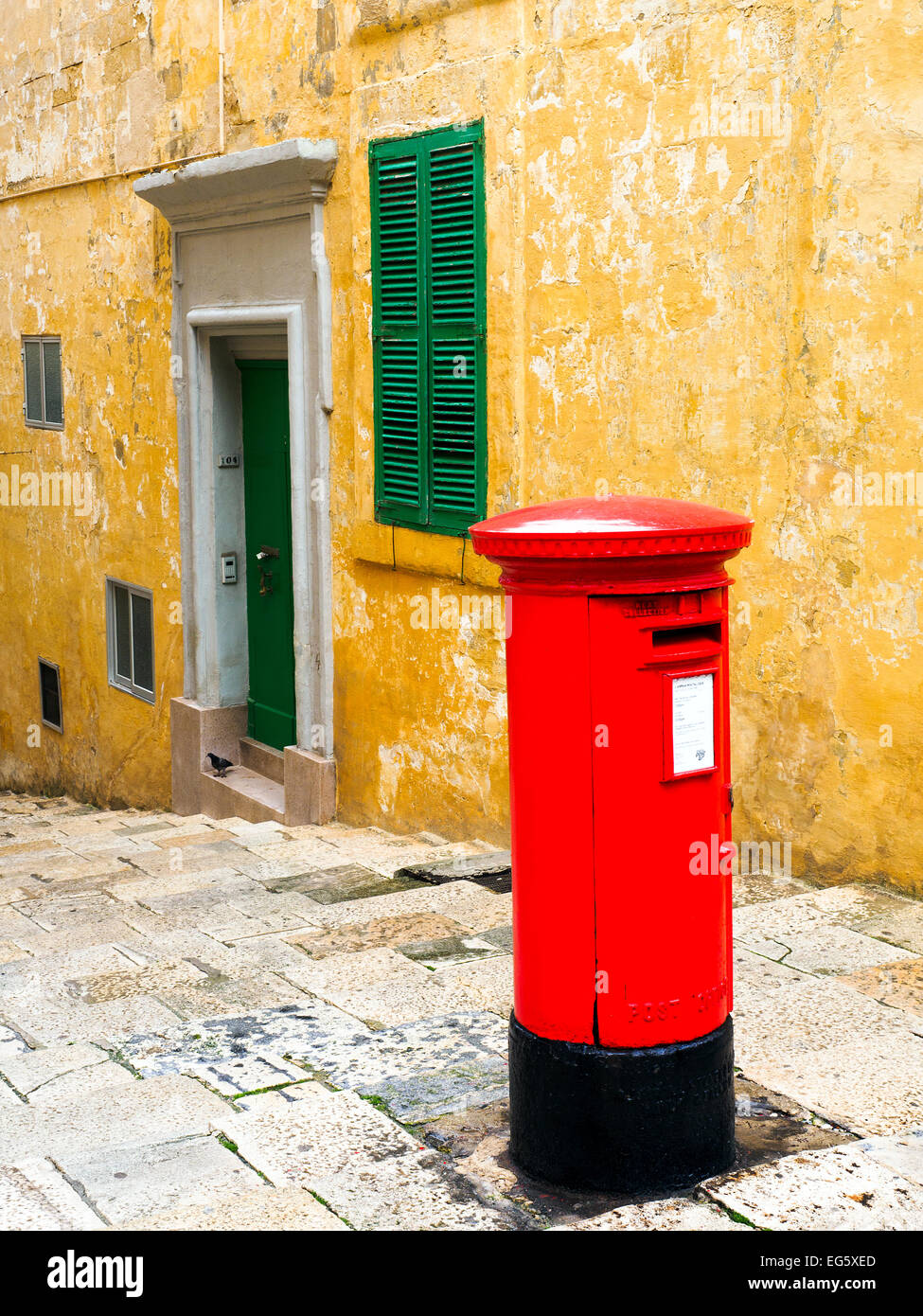 Red British style post box - Valletta, Malta Stock Photo