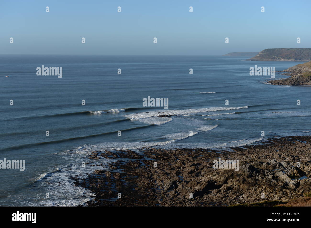 View from headland of  of the indented coastline and numerous surf breaks at Langland Bay , Gower, Wales Stock Photo