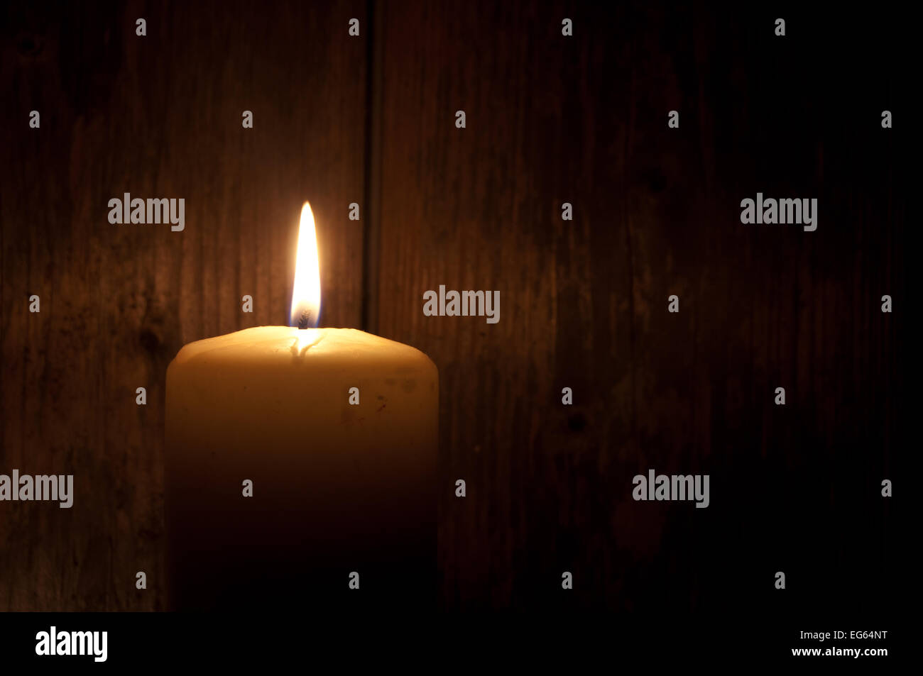 Single lit candle in the dark (also space for text Stock Photo Alamy