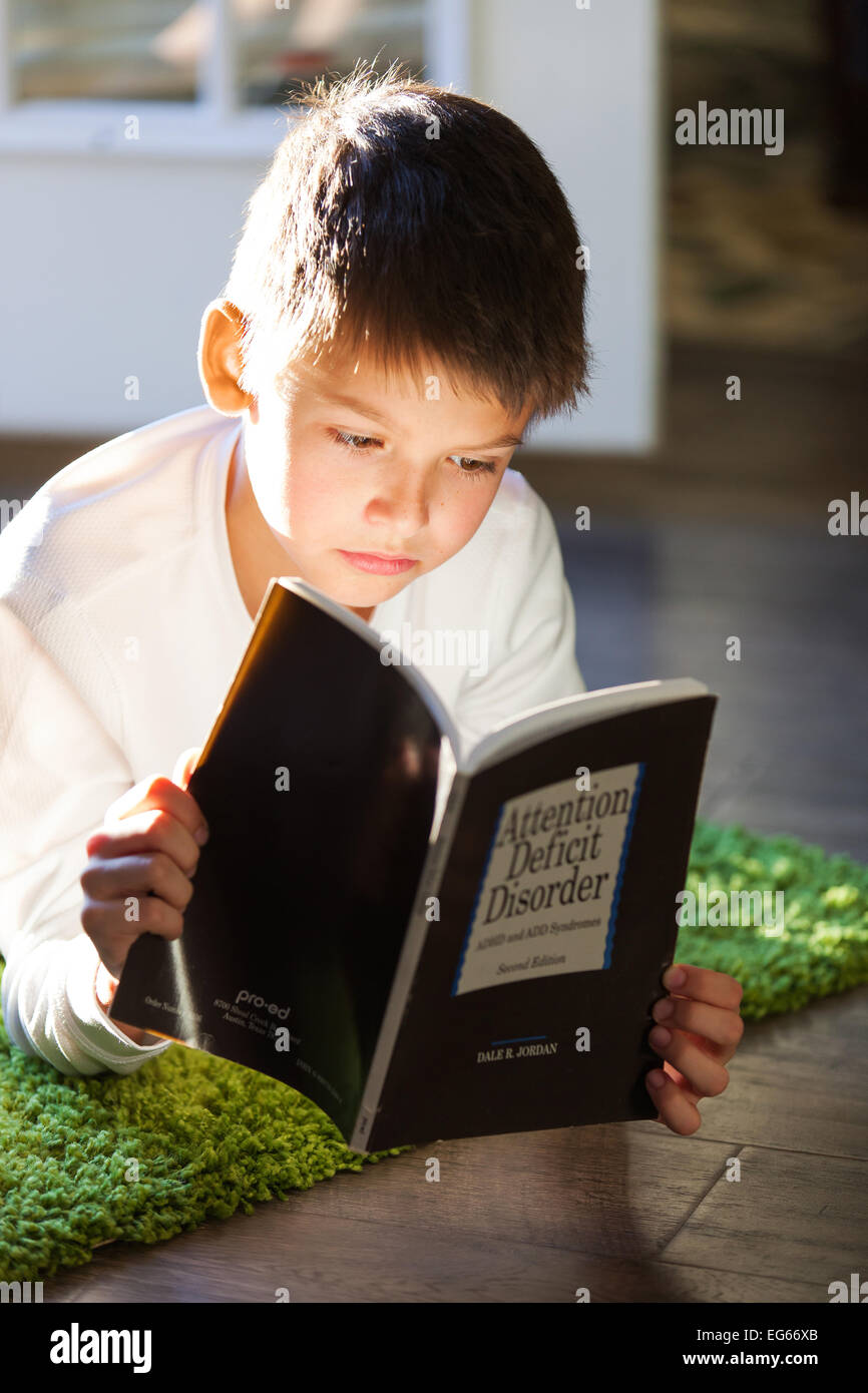 boy reading a book Stock Photo