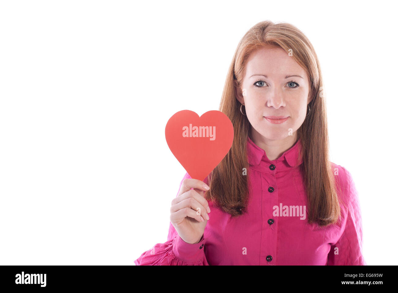 Beautiful girl with paper heart on a white background. Stock Photo