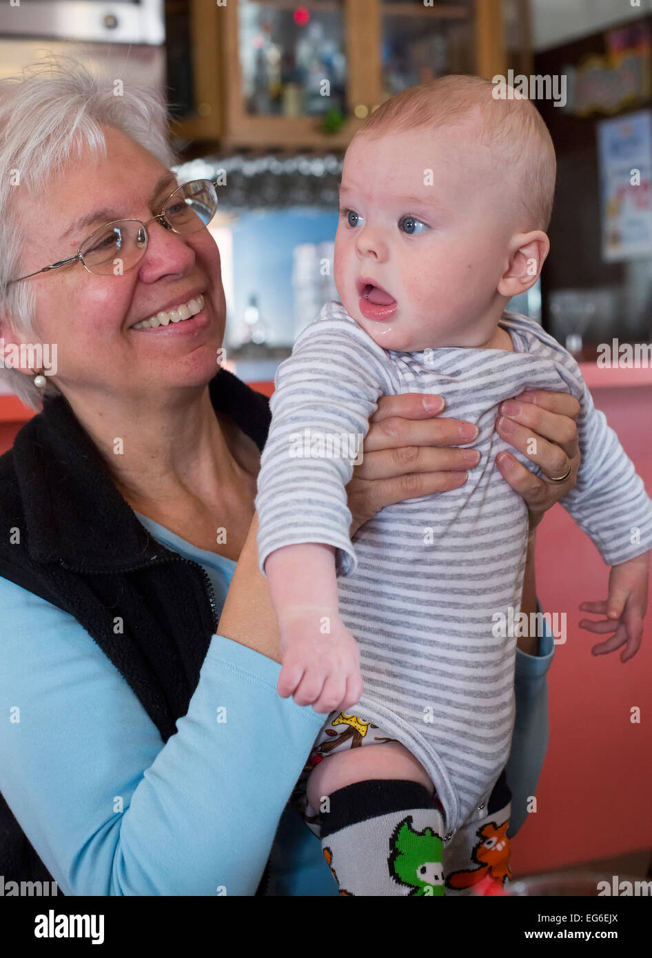 Denver, Colorado - Susan Newell, 66, holds her seven-month-old grandson, Adam Hjermstad Jr. Stock Photo