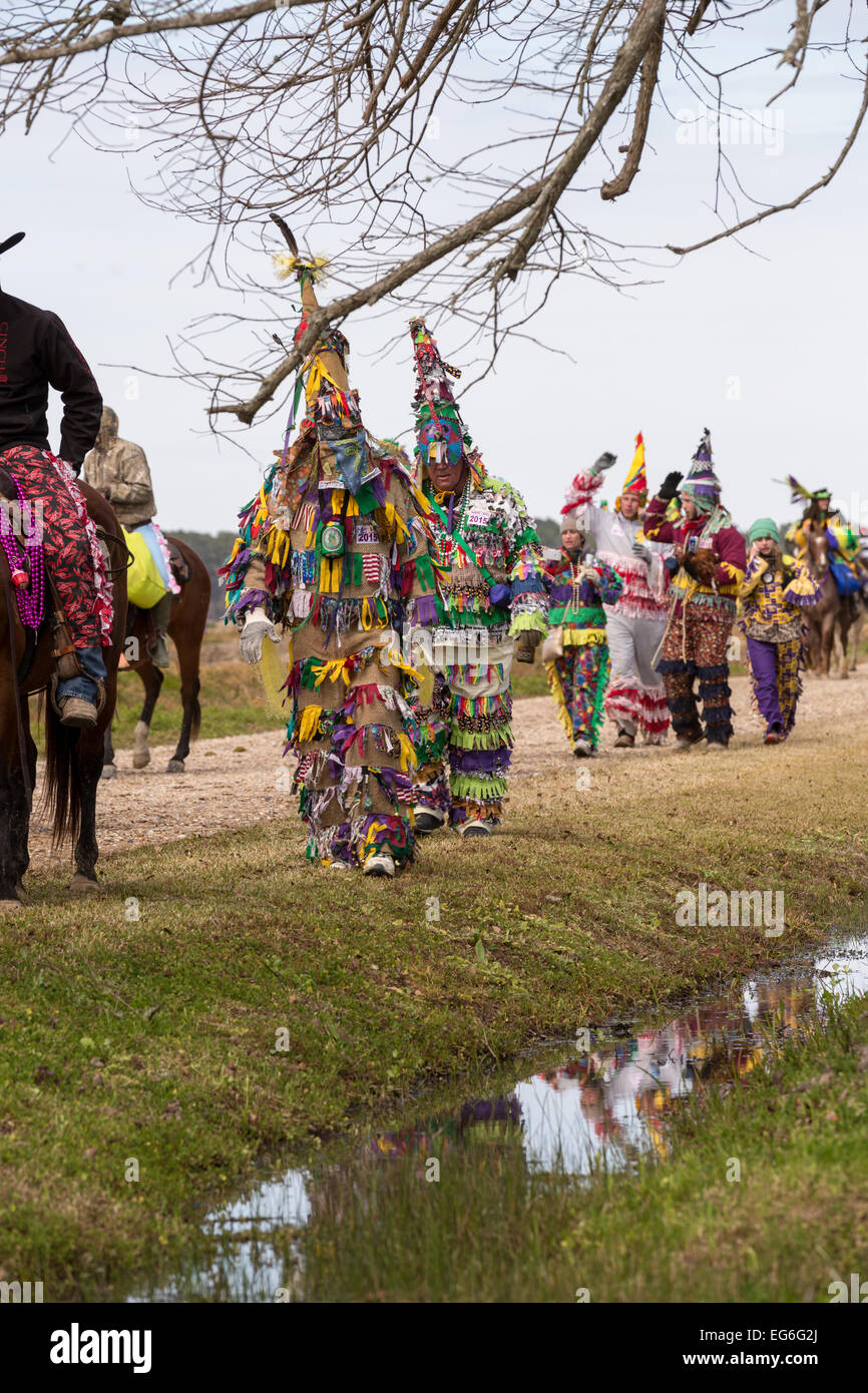 Victorious young boy chicken catcher during the traditional Chicken Run for  Lake Charles family friendly Mardi Gras Stock Photo - Alamy