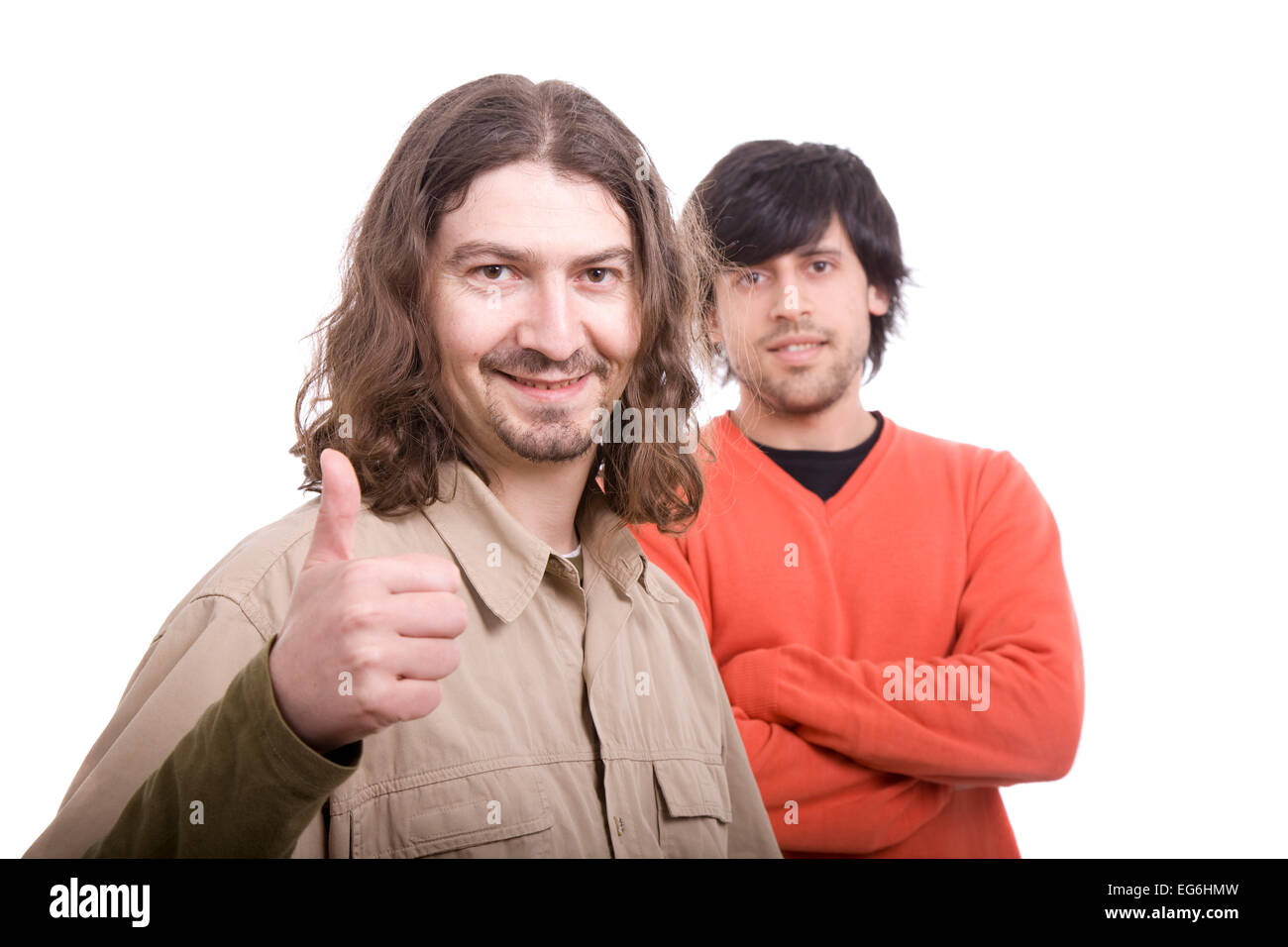 Two casual men posing, isolated over white background Stock Photo - Alamy