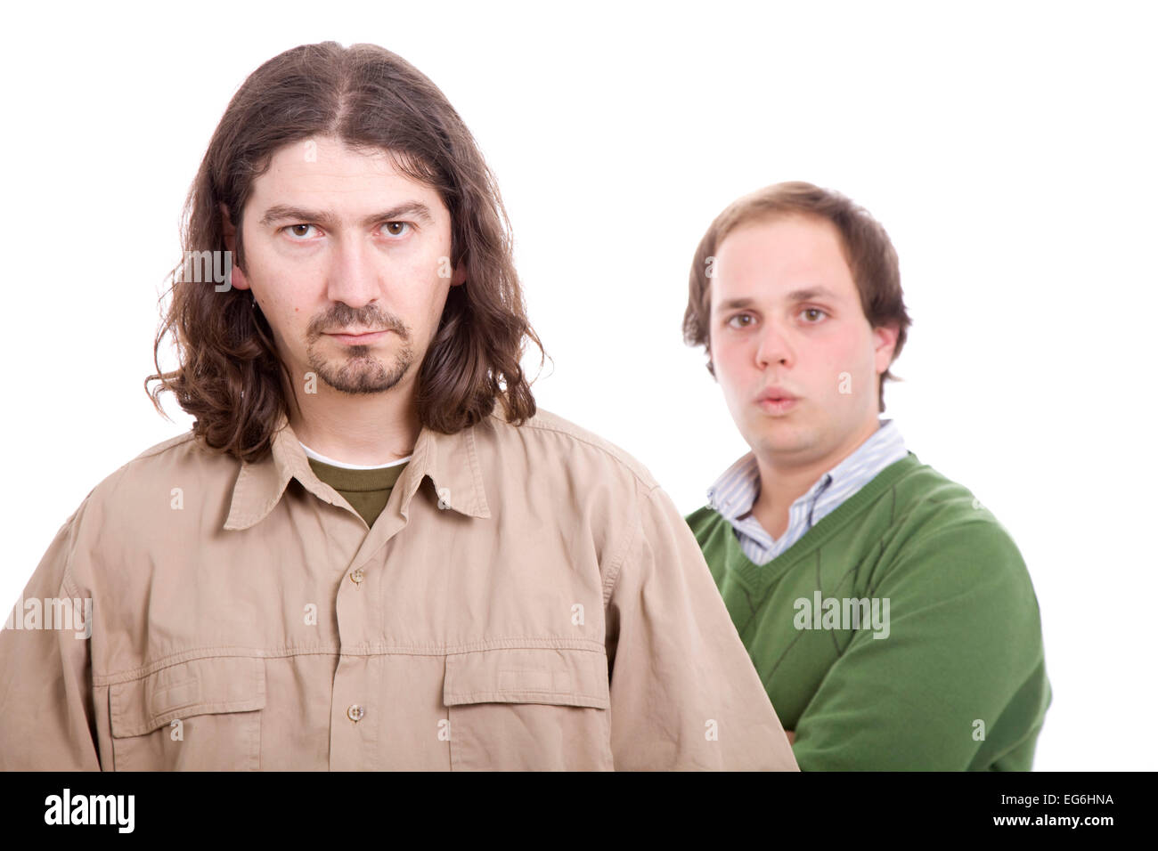 Two casual men posing, isolated over white background Stock Photo - Alamy