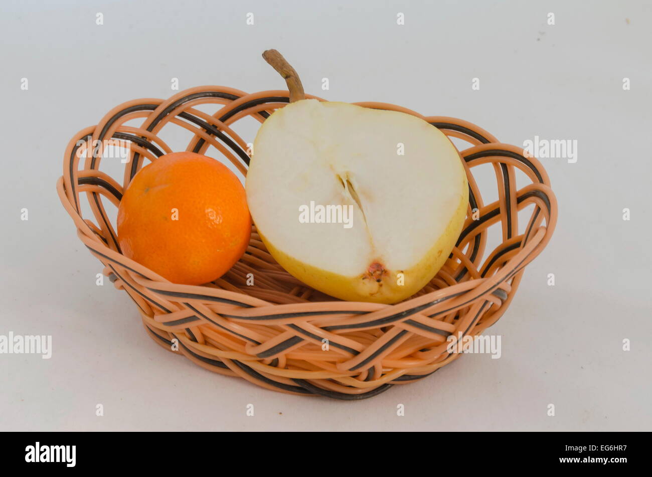 Fruits in small basket Stock Photo Alamy