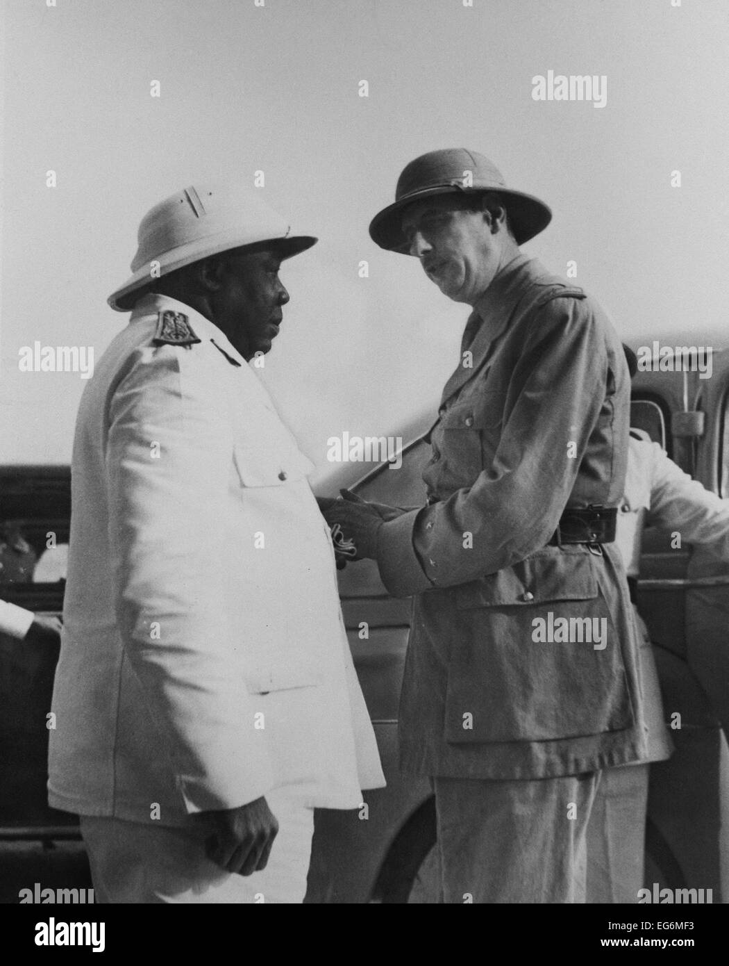 Charles de Gaulle, chief of the Free France, in Chad with Governor-General Eboue. Eboue, a native of French Guinea, was the Stock Photo