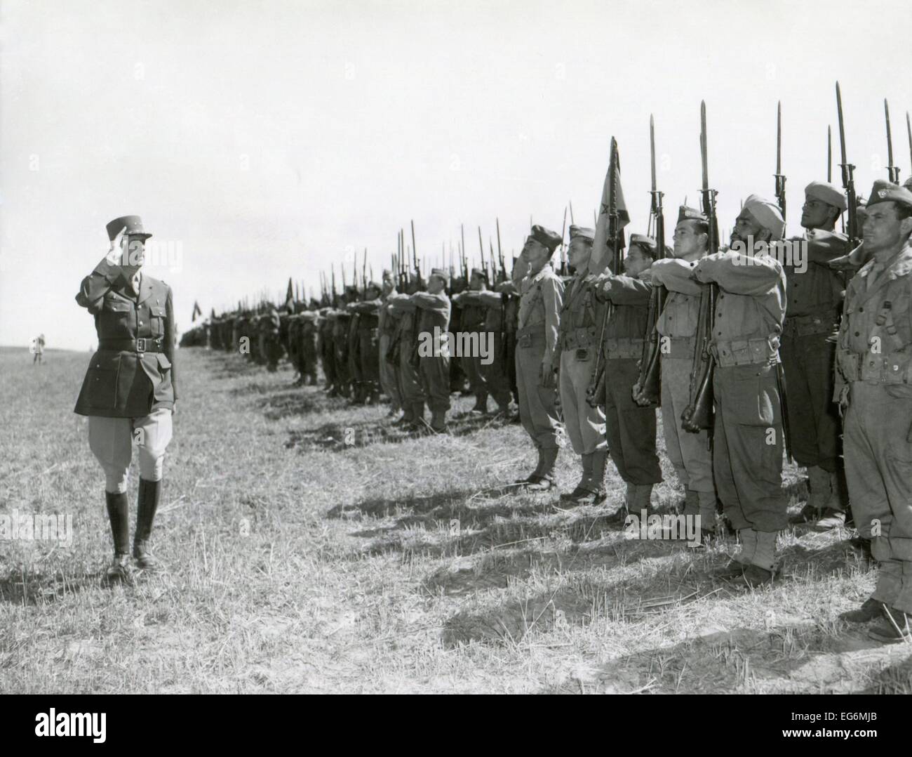 General Charles DeGaulle reviews French Expeditionary Forces. Montenero area, Italy, June 29, 1944. World War 2. Stock Photo