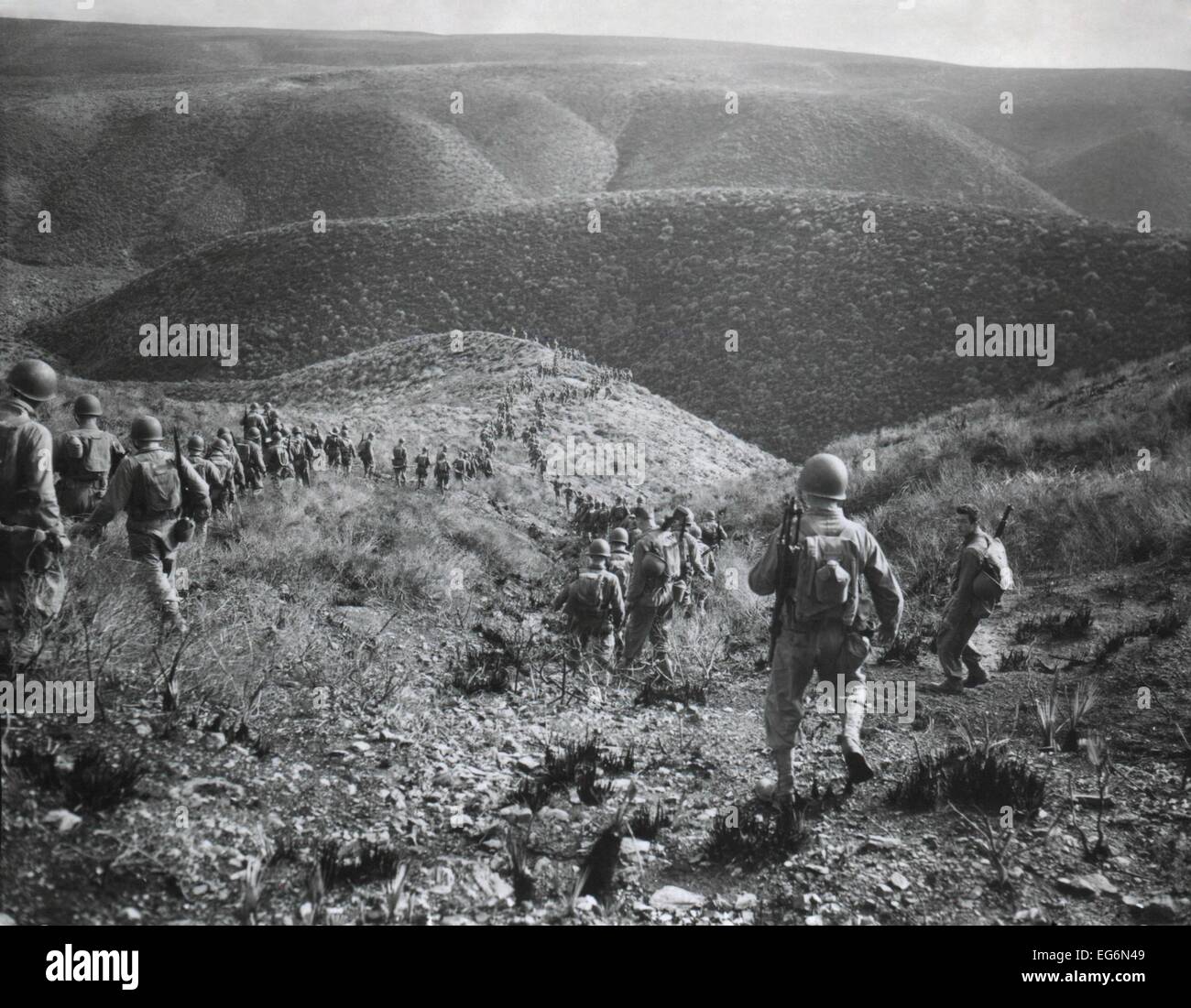 U.S. First Ranger Battalion on a speed march over hilly terrain at Arzew, Algeria, North Africa. Most U.S Troops were 'green' Stock Photo