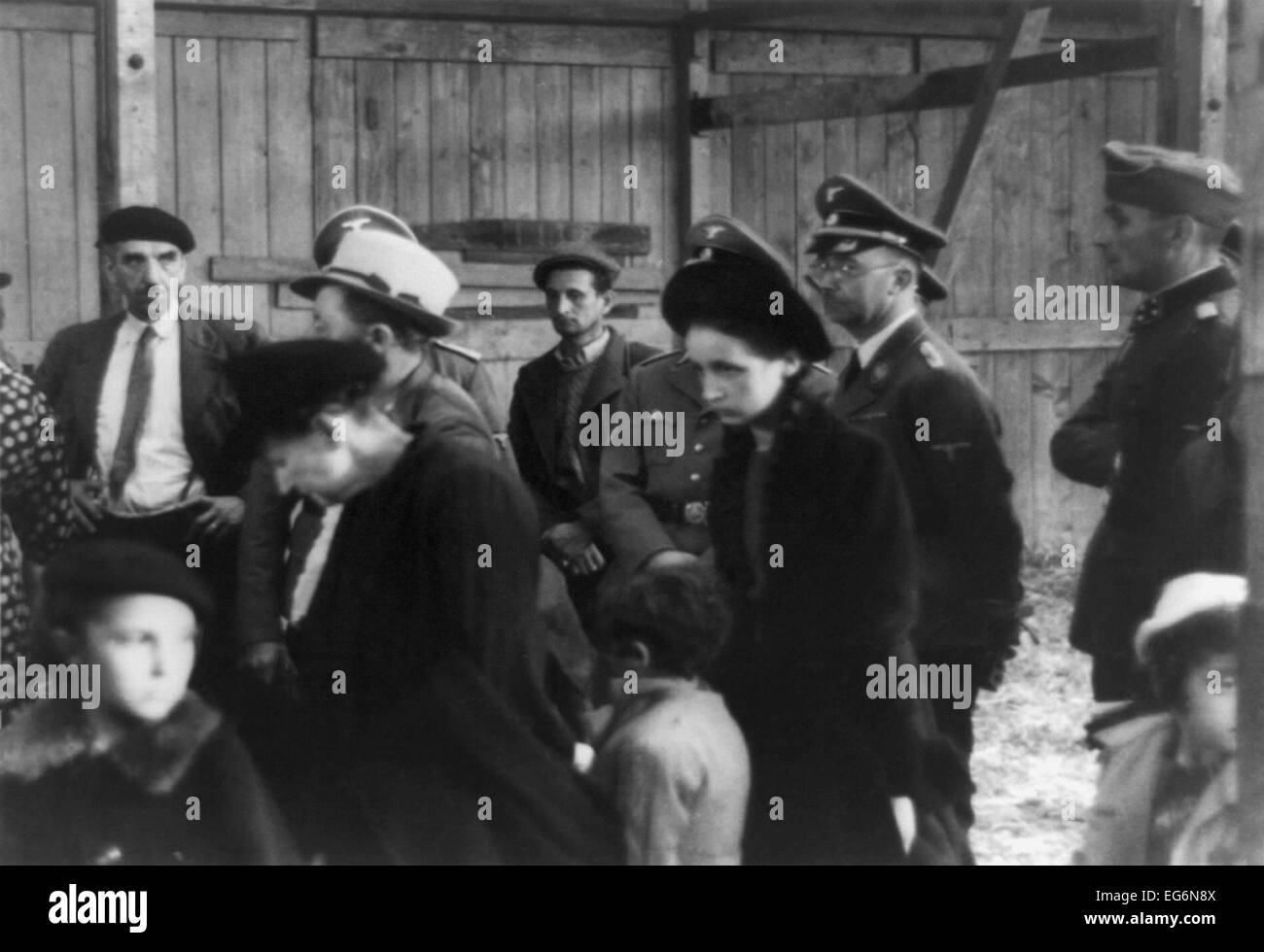 Heinrich Himmler standing near refugees in occupied Metz, France. Photo ...