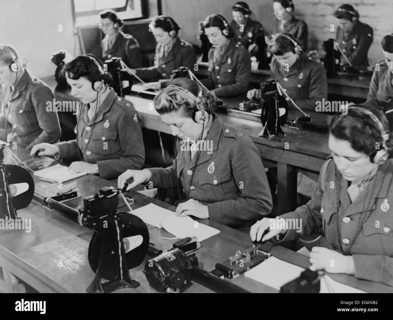 British enlisted women learning Morse code in classroom. Ca. 1942. World War 2. (BSLOC 2014 10 199) Stock Photo