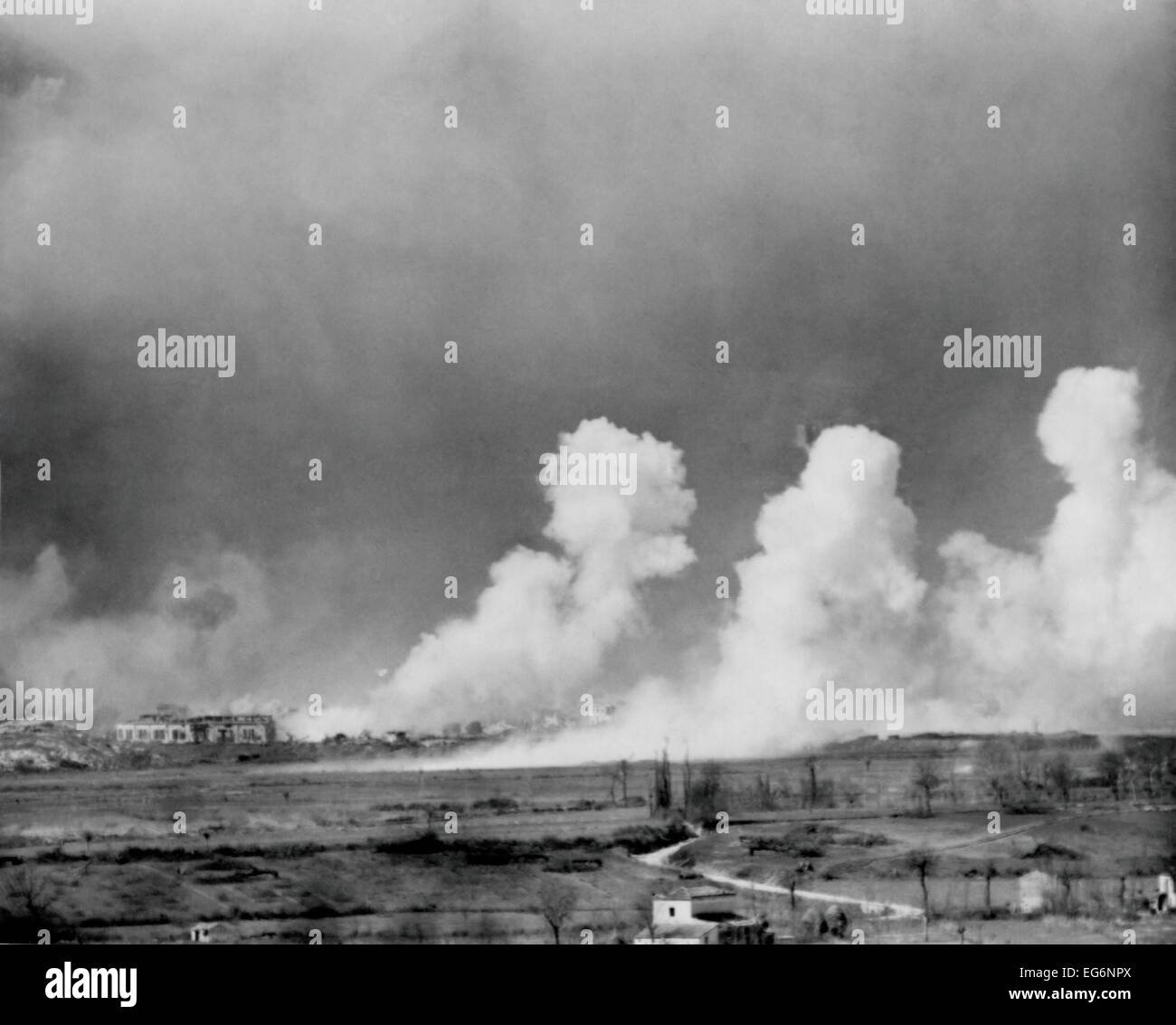 American bombs explode in the town of Cassino, Feb. 15, 1944. The town was completely destroyed but German defenders survived Stock Photo