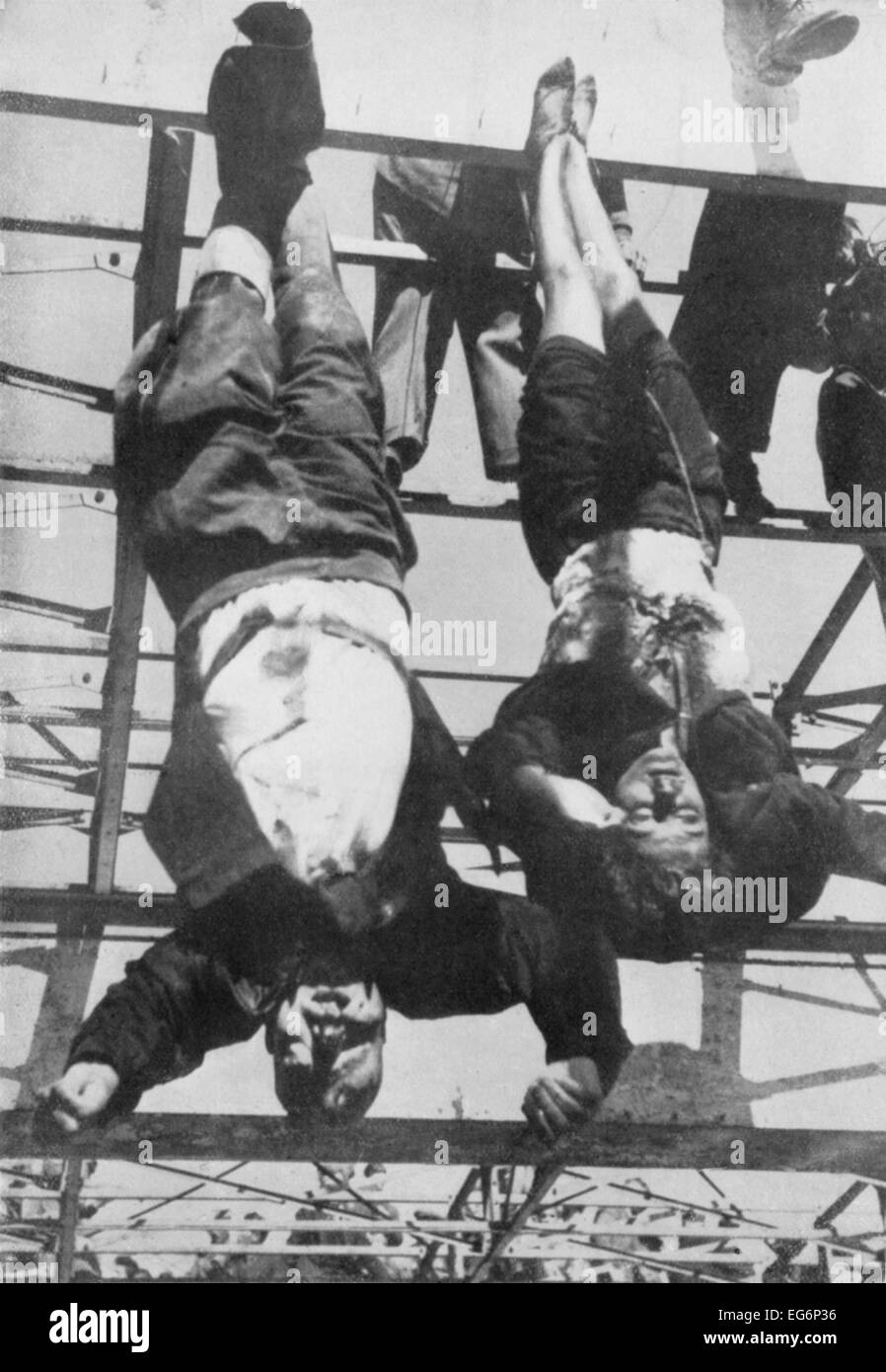 Executed Benito Mussolini and mistress, Clara Petacci, hanging by feet. Milan, Italy, May 1945. World War 2. (BSLOC_2014_10_54) Stock Photo