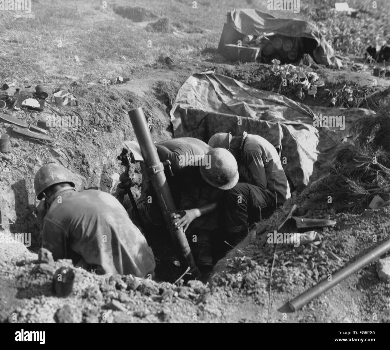 Marines fire an 81 mm mortar in the Battle of Obong-ni Ridge, August 17-19, 1950. It was part of the larger First Battle of the Stock Photo