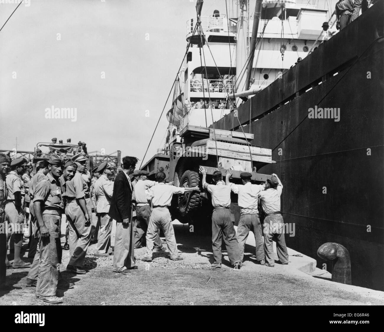 American-made truck lowered from a freighter at Piraeus as part of a relief effort to Greece. U.S. aid supported the Stock Photo