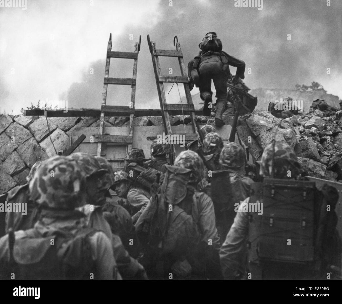 U.S. Marines use scaling ladders to storm ashore at Red Beach in the amphibious invasion of Inchon. Sept. 15, 1950. Korean War, Stock Photo